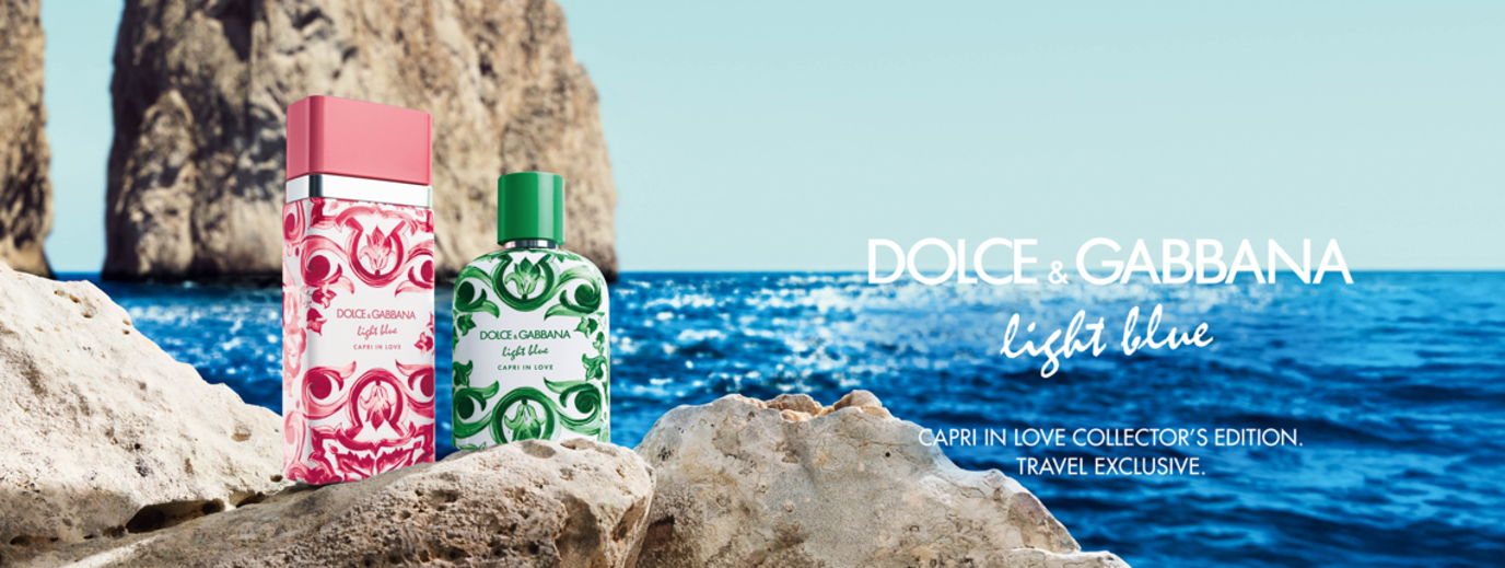 Dolce & Gabbana Light Blue Capri in Love – perfume bottles by the sea. Buy now!