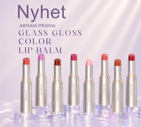 Åtte Armani lip balms i ulike farger med teksten “Nyhet – Armani Prisma Glass Gloss Color Lip Balm”. Kjøp nå!