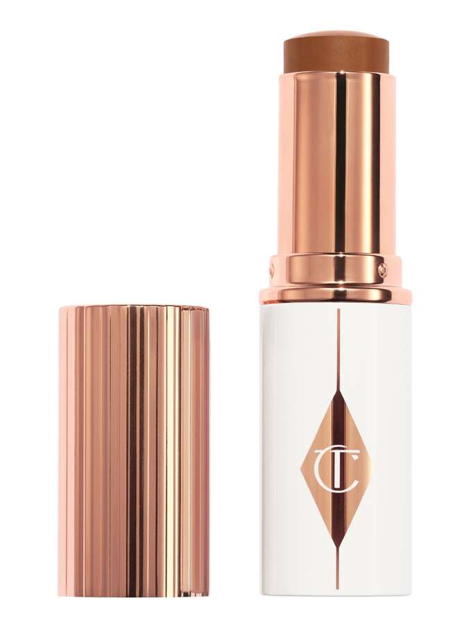 Charlotte Tilbury Unreal Skin Sheer Glow Tint Hydrating Foundation Stick - 14 Deep
