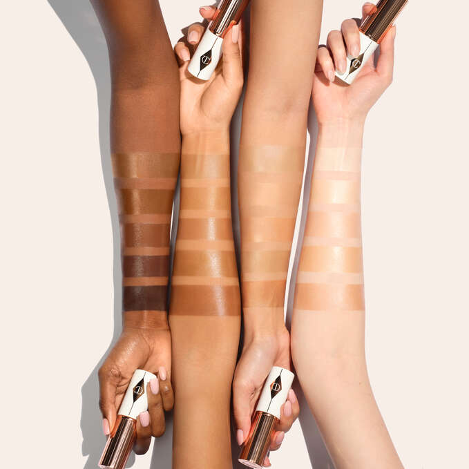 Charlotte Tilbury Unreal Skin Sheer Glow Tint Hydrating Foundation Stick - 9 Tan 2