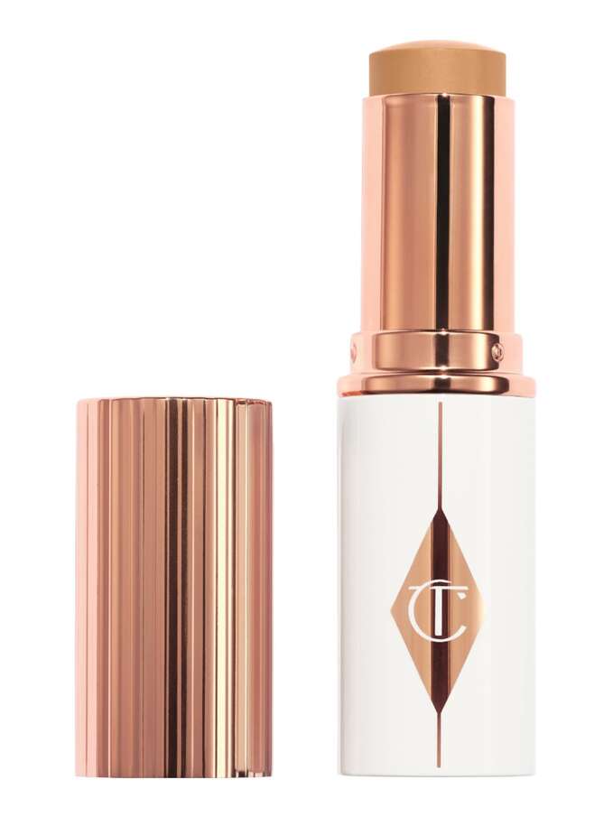 Charlotte Tilbury Unreal Skin Sheer Glow Tint Hydrating Foundation Stick - 9 Tan